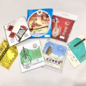 A variety of packages of Chinese instrument strings.