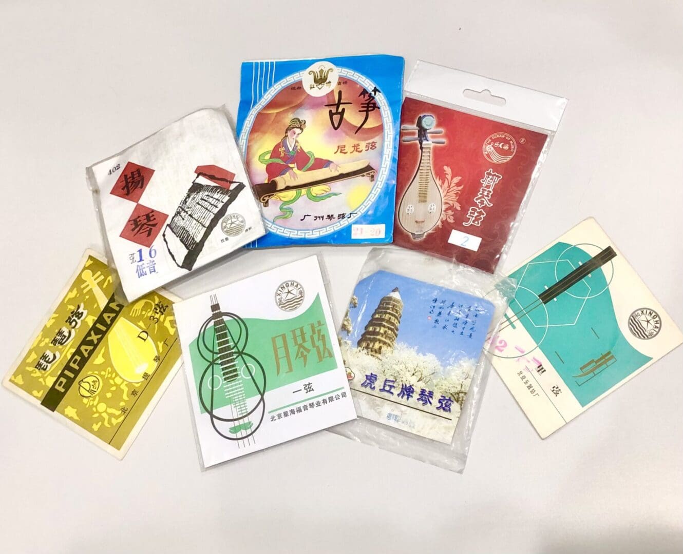 A variety of packages of Chinese instrument strings.