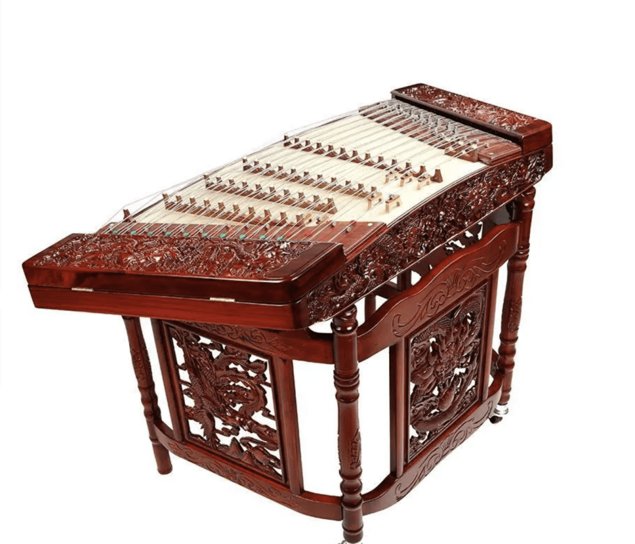Intricately carved wooden yangqin, a Chinese hammered dulcimer, isolated on a white background.